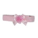 Pink headband for baby girls, featuring a soft flower accent and satin ribbon detailing.