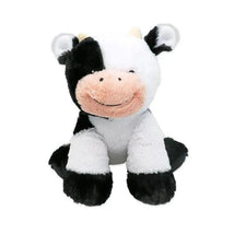 Plush sitting cow toy with black and white fur, a smiling face, and small yellow horns, designed for children.