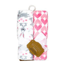 Flannel fleece blanket set featuring pink bunnies and a heart pattern, tied with a ribbon and tag.