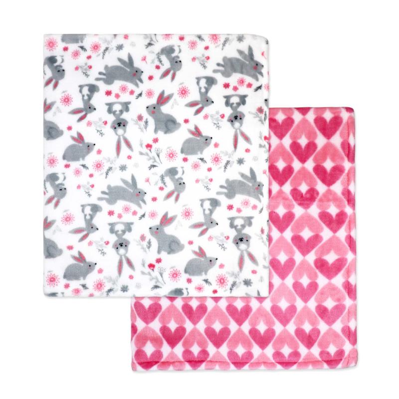 Flannel fleece blanket set featuring one blanket with pink bunnies on a white background and a solid pink heart-patterned blanket.