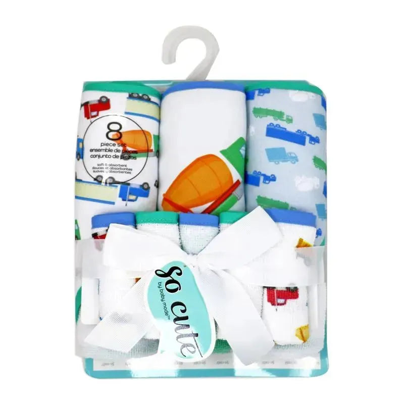 Hooded towels and washcloths featuring green trucks, packaged with a bow, ideal for bath time.