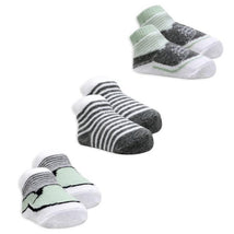 Three pairs of crew socks for infants, featuring a sage green pair, a striped gray and white pair, and a mint-green accented pair.