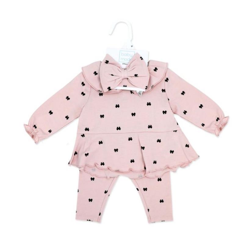 Baby girl legging and headband set featuring a pink outfit with black bow prints and a matching headband.