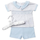 Baby boys short set featuring a white top with blue collar and rocking horse motif, paired with blue shorts.