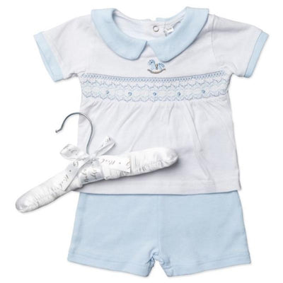 Baby boys short set featuring a white top with blue collar and rocking horse motif, paired with blue shorts.