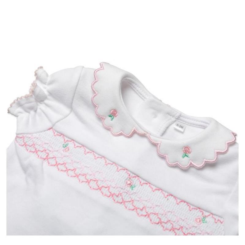 Short-sleeve white baby girl top with a scalloped collar, pink floral embroidery, and smocking detail across the front.
