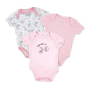 Three girl’s bodysuits in a set: one with a bunny print on a white background, two in pink, one featuring bunny artwork and text.