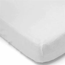 Solid flannel crib sheet in light grey, featuring a soft texture and fitted corners for secure placement on a crib mattress.