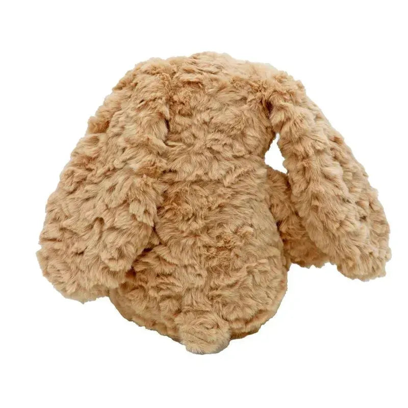 Soft plush bunny in a light tan color, featuring long floppy ears and a textured fur appearance.
