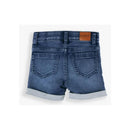 Medium wash denim skort for baby boys, featuring rolled hem, back pockets, and a tan stitched label.