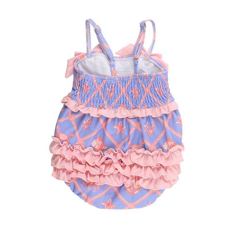 One-piece baby swimsuit in a tropical trellis design, featuring blue fabric with coral sea life patterns and rear ruffles.