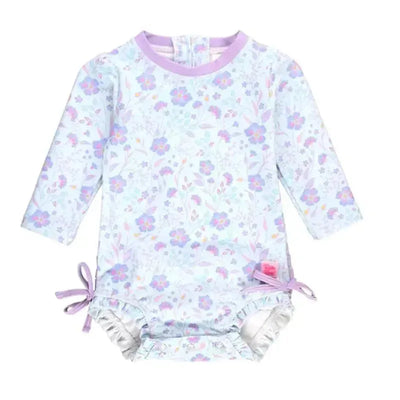 Long sleeve one-piece rash guard for babies, featuring a pastel floral pattern and tie details at the sides.