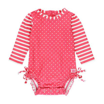 Hot pink long sleeve one-piece rash guard with white heart print and striped sleeves, designed for infants 12/18 months.