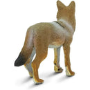Lifelike 3.75-inch coyote figurine with detailed fur texture and realistic coloring, showcasing its back and tail.