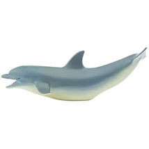 Dolphin figurine from Safari Ltd, displaying a smooth body with a light gray-blue color and an expressive open mouth.