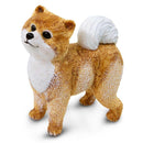 Realistic Pomeranian dog figure, featuring a tan and white coat, standing with an alert expression and fluffy tail.