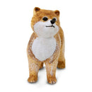 Realistic Pomeranian figurine with a fluffy golden coat and white chest, standing in a playful pose.