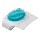 Cradle cap brush and comb set by Safety 1st, featuring a soft blue bristle head and a white handle.