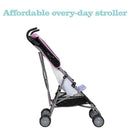 Minnie Play All Day umbrella stroller featuring a gray frame, pink accents, and a foldable design for easy transport.