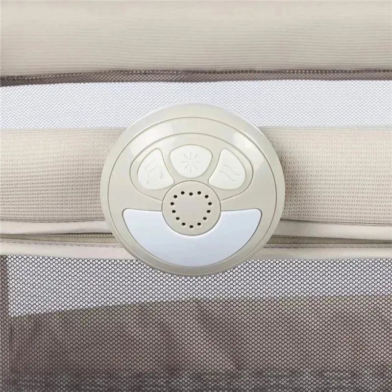 Control panel of the Safety 1st Rest-and-Romp 2-in-1 Bassinet & Play Yard, featuring buttons for sounds and lights.