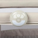 Control panel of the Safety 1st Rest-and-Romp 2-in-1 Bassinet & Play Yard, featuring buttons for sounds and lights.