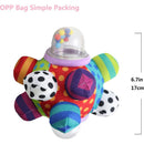 Brightly colored Sassy Developmental Bumpy Ball with various textures, patterns, and a clear dome containing colorful beads.