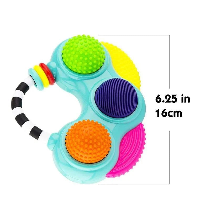 Sassy Do-Re-Mi Textured Tunes toy featuring colorful textured buttons and a handle, measuring 6.25 inches.