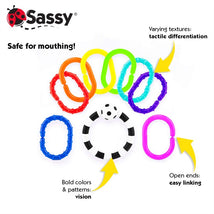 Colorful plastic rings in various shapes and textures, labeled with features for sensory development and safe for mouthing.