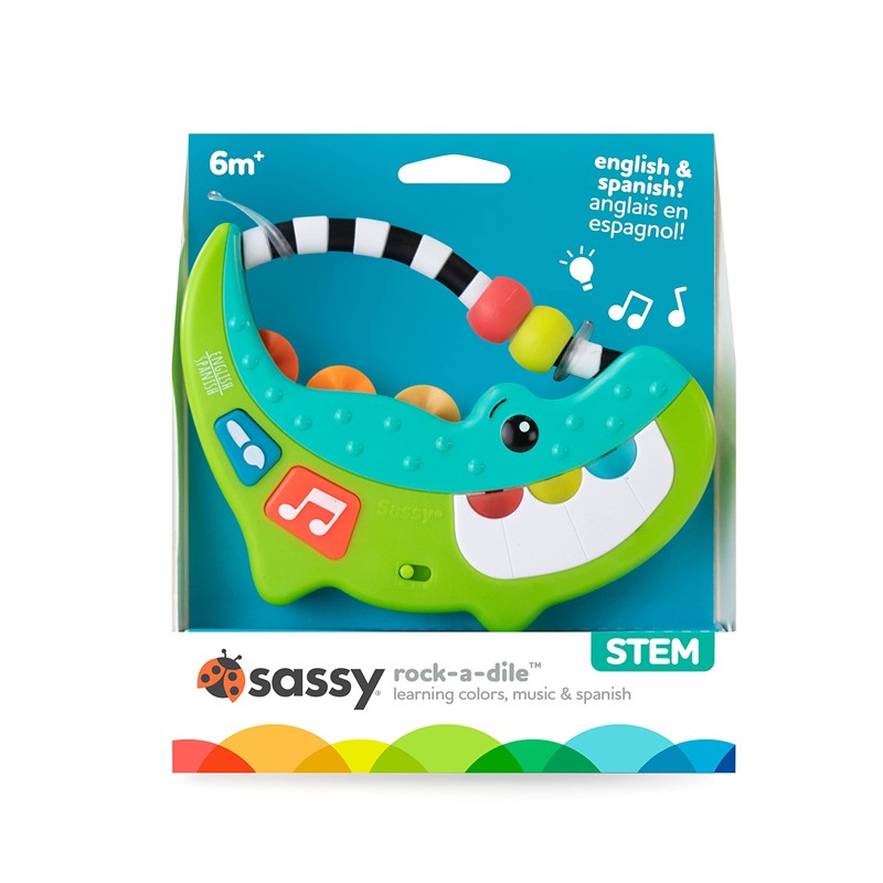 Sassy Rock-A-Dile Musical Toy in bright green, featuring colorful beads and buttons for learning colors, music, and Spanish.