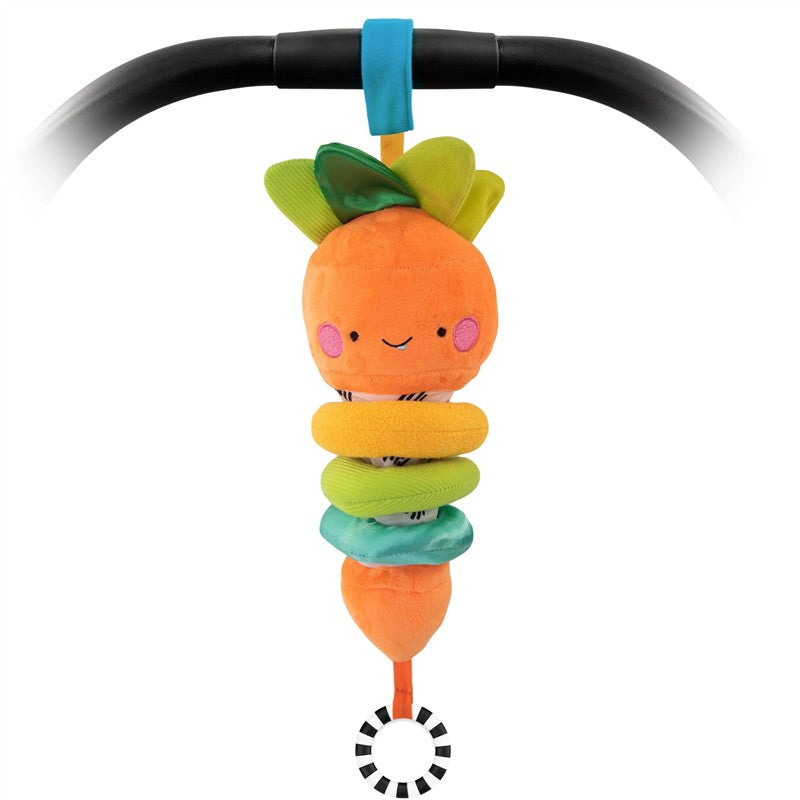 Plush carrot toy with colorful rings, smiling face, and a black-and-white patterned hanging ring, designed for infants.