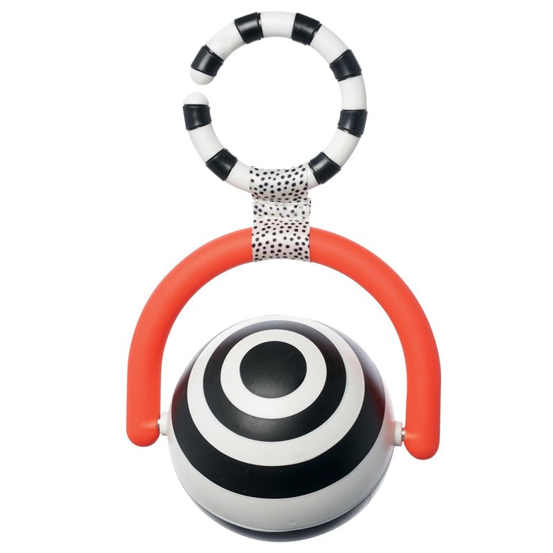 Sassy Wimmer Bullseye Ball featuring a black and white striped ball with concentric circles, attached to an orange handle.
