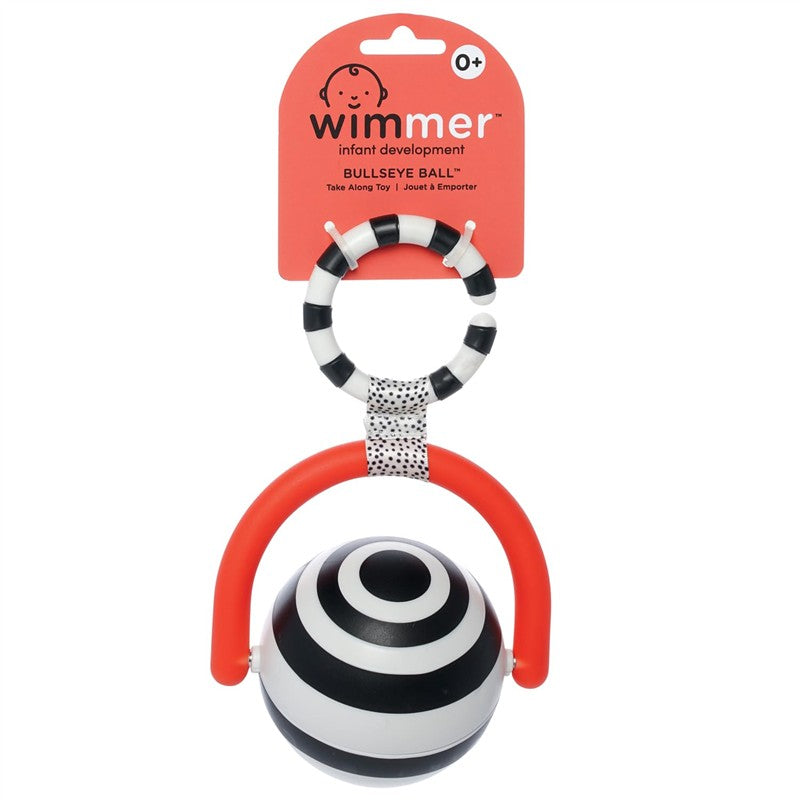 Black and white striped bullseye ball attached to a red handle with a black and white ring, designed for infants.