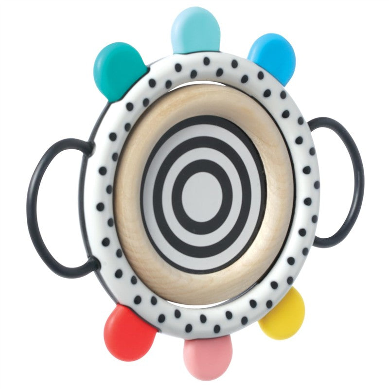 Sassy Wimmer Grasp & See Mirror featuring a circular design with colorful handle grips and a concentric black and white spiral pattern.