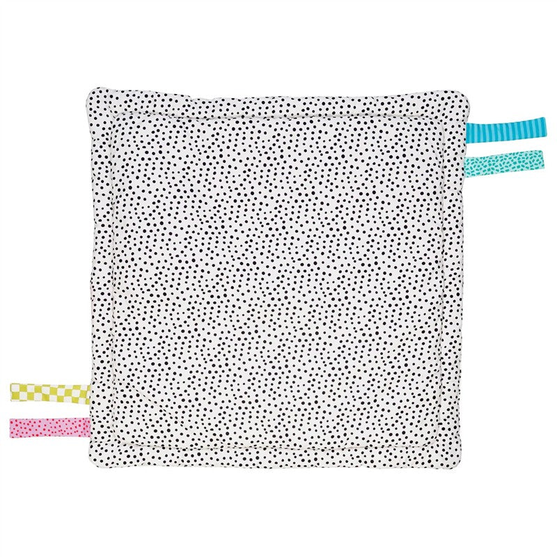 Sassy Wimmer Seek & Explore Mat featuring a black polka dot pattern with colorful fabric tags on three corners for sensory exploration.