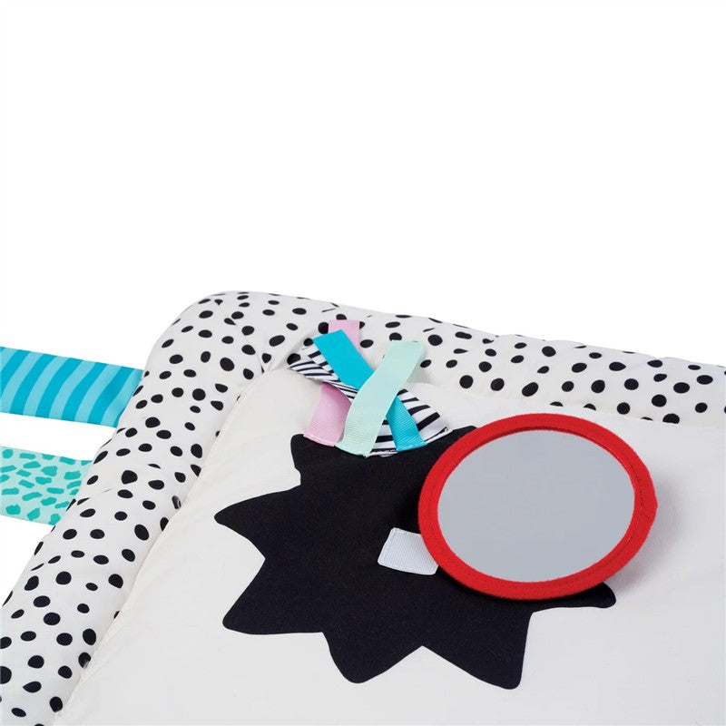 Sassy Wimmer Seek & Explore Mat featuring a soft design with colorful ribbons and a round mirror for sensory play.