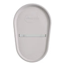 Squishy taupe baby changing diaper pad with a smooth surface and secure strap for safety.