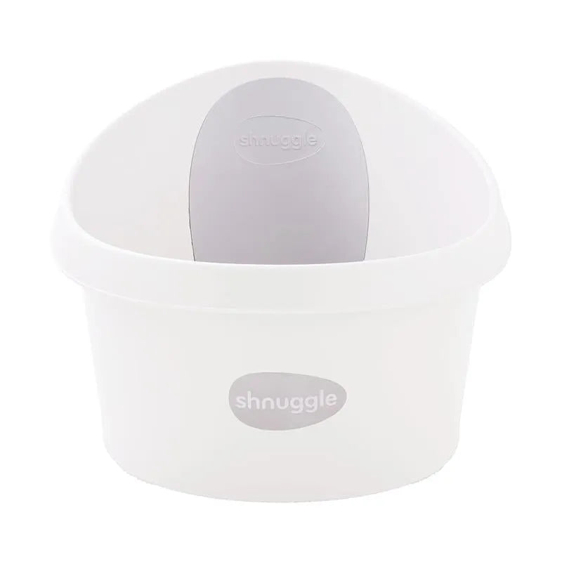 Toddler bath tub in white and grey, featuring a cushioned back support and the Shnuggle logo on the front.