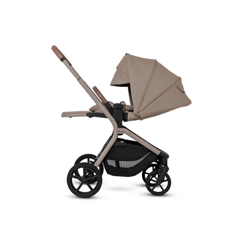 Silver Cross Breez Compact Stroller in Champagne color with a large canopy, adjustable handle, and storage basket.