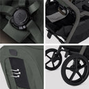 Compact Silver Cross Breez stroller in pewter color, showcasing harness, storage compartment, ventilation, and wheel details.