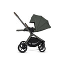 Compact Silver Cross Breez stroller in pewter color with a canopy and storage basket, designed for easy maneuverability.