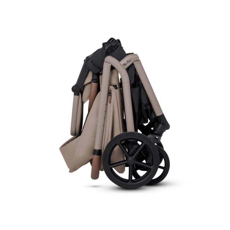 Silver Cross Breez Modular Stroller in champagne, folded with black wheels and tan accents.