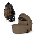Silver Cross Breez Modular Stroller & Bassinet Bundle in maple color, featuring a compact foldable stroller and a bassinet.
