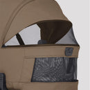 Modular bassinet with a mesh window, part of the Silver Cross Breez Stroller & Bassinet Bundle in Maple color.