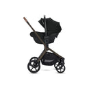 Silver Cross Breez Modular Stroller & Bassinet Bundle in Maple, featuring a black seat and canopy with a sleek design.