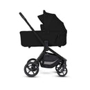 Silver Cross Breez Modular Stroller and Bassinet Bundle in Onyx, featuring a sleek black design and spacious bassinet attachment.