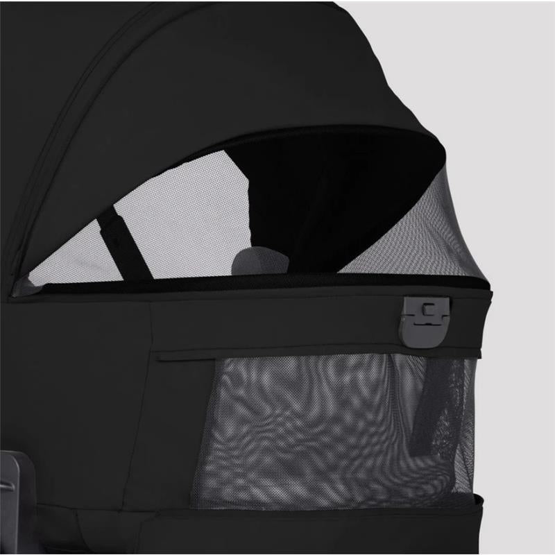 Breez Modular Stroller bassinet in Onyx color, featuring a black fabric cover with mesh ventilation panels.