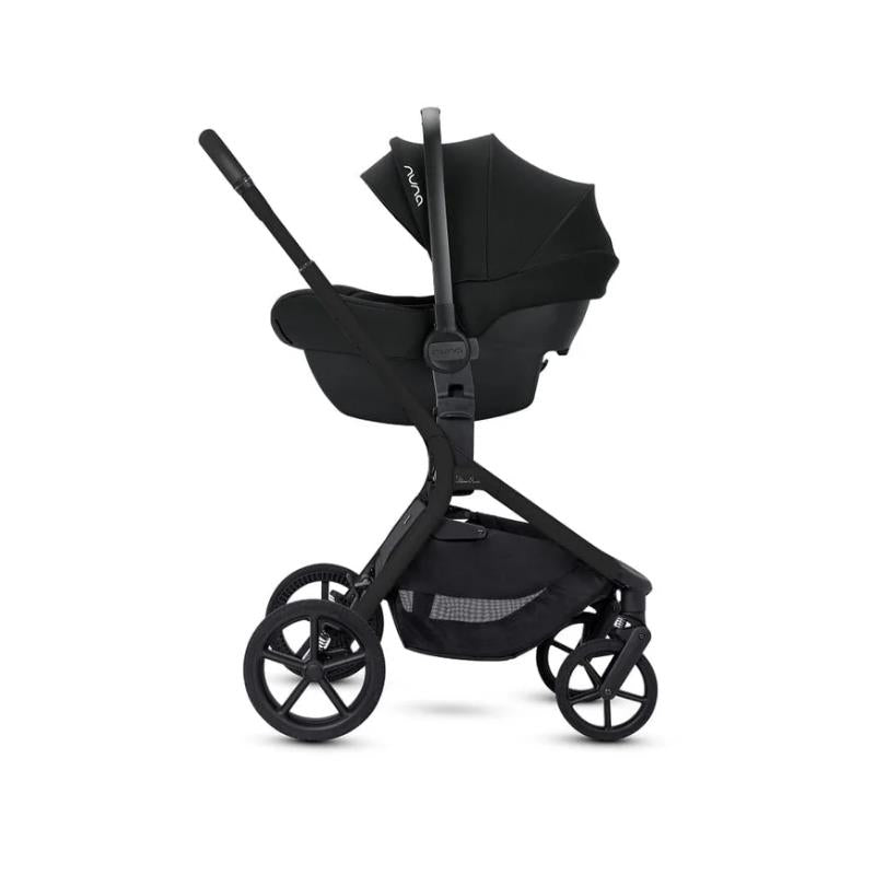 Silver Cross Breez Modular Stroller and Bassinet Bundle in Onyx color, featuring a sleek black design and large wheels.