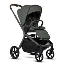 Silver Cross Breez modular stroller in pewter with a rounded handlebar and large wheels, designed for versatility and comfort.