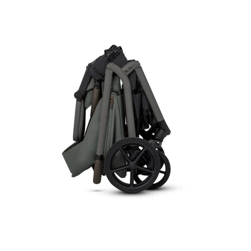 Silver Cross Breez modular stroller and bassinet bundle in pewter color, shown in a folded position for easy storage.