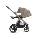 Silver Cross Cove 2 all-terrain stroller in champagne with a large canopy and spacious storage basket.